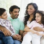 Happy family enjoying new heat pump